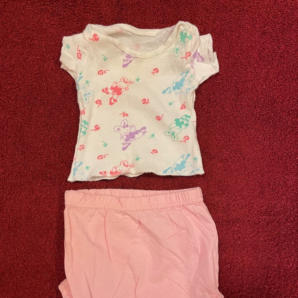 Infant t-shirt and bottom set. White tee with design. Solid pink bottoms. 6-9M